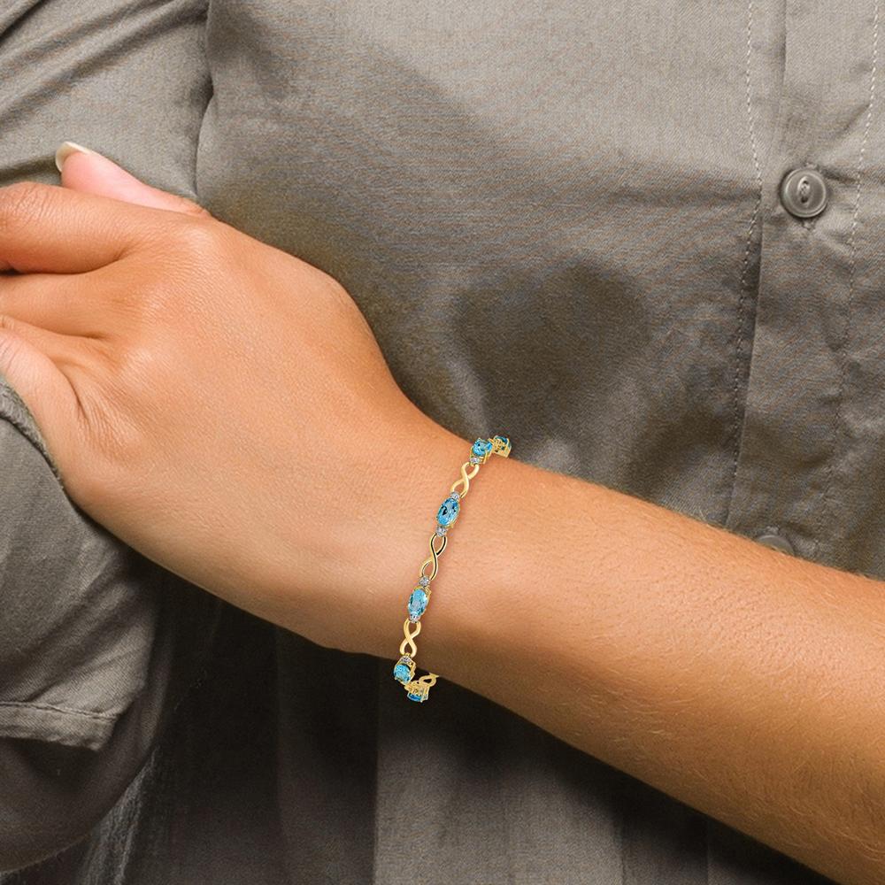 10K Yellow Gold Swiss Blue Topaz and Diamond Infinity Bracelet - 0.56 Carats Total Topaz Weight by Monteluci Fine Jewelry - Image 5