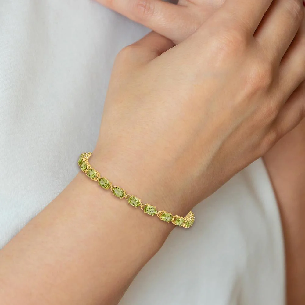 14K Gold 7" Tennis Bracelet with 6x4mm Oval Faceted Peridot - 0.45 Carats Total Peridot Weight by Monteluci Fine Jewelry - Image 4
