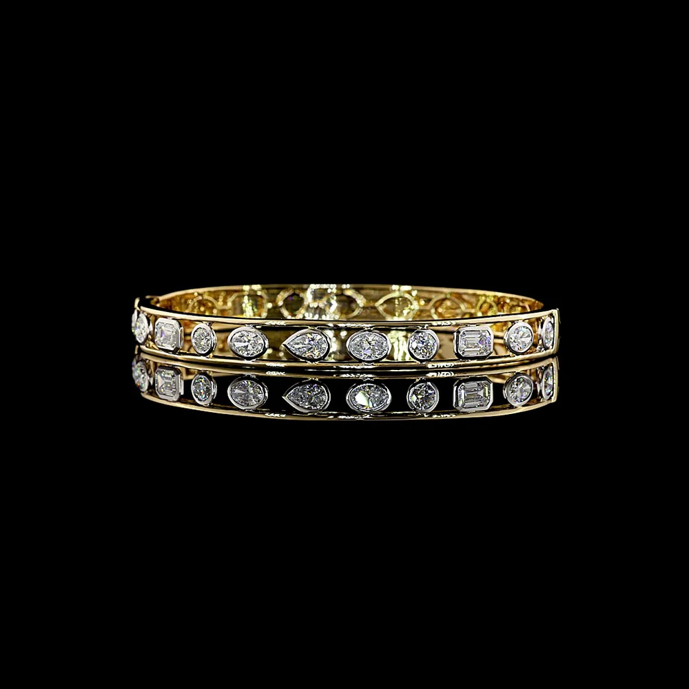 14K Two Tone Mixed Shape Bangle Bracelet with Bezel Set Oval, Emerald, Pear, and Round Lab Diamonds - 2.64 Carat Total Weight - Covaloro Fine Jewelry