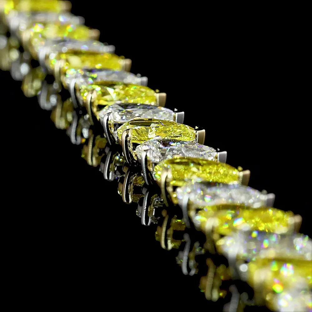 14K Two Tone Tennis Bracelet with Alternating Pear Shape Fancy Yellow and White Diamonds - 17.27 Carat Total Weight - Covaloro Fine Jewelry - Image 2