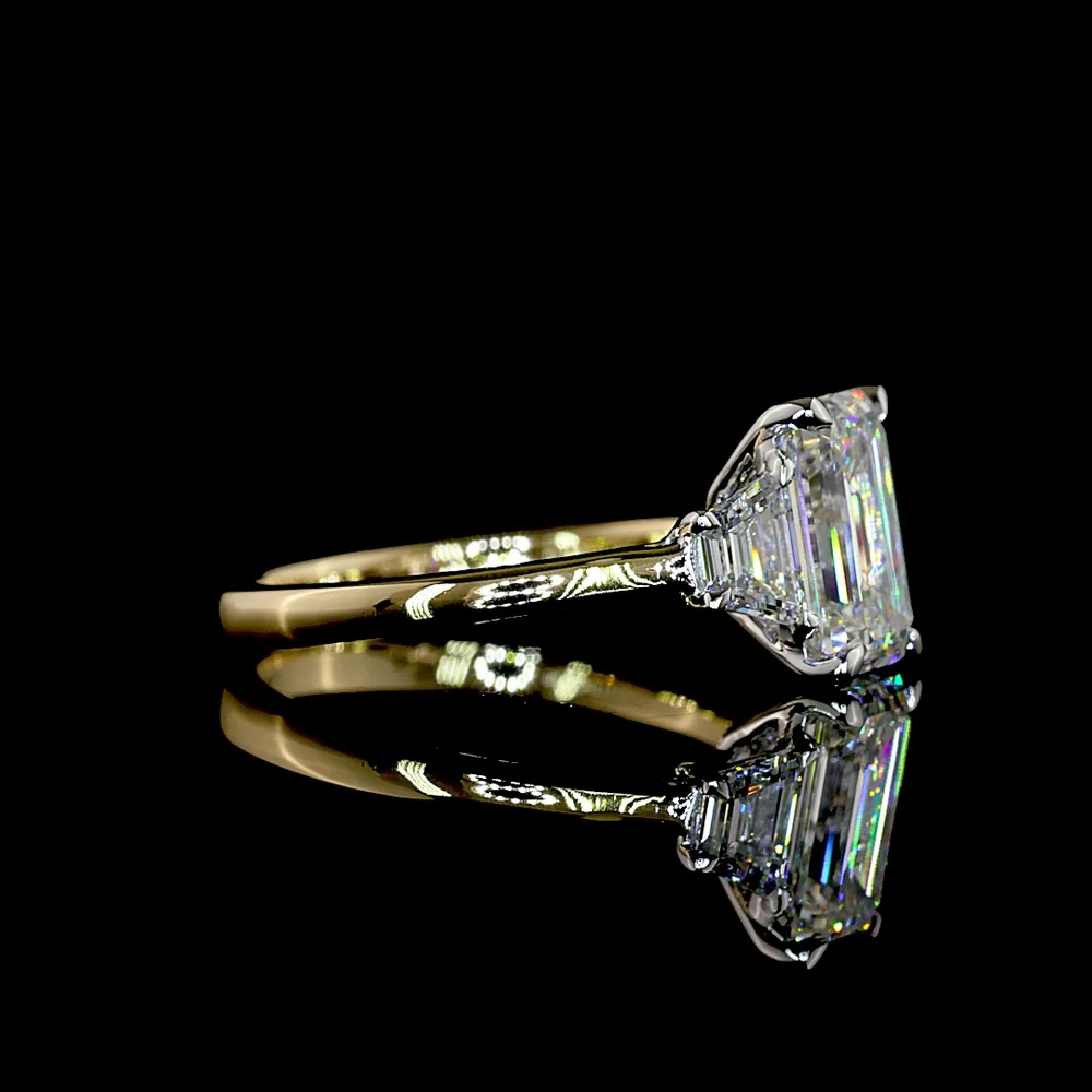 14K Two Tone Three Stone Ring with 2.04 Carat Emerald Cut Lab Diamond and Trapezoid Side Stones - 2.65 Total Carat Weight - Covaloro Fine Jewelry - Image 2