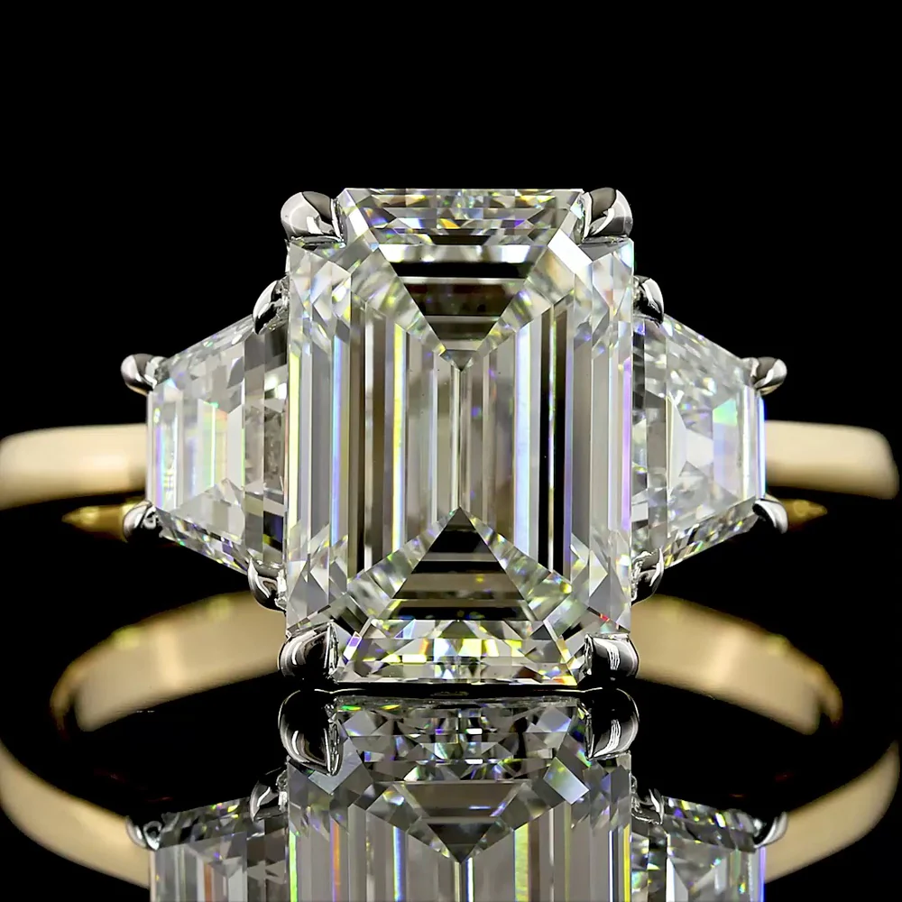14K Two Tone Three Stone Ring with 3.05 Carat Emerald Cut Lab Diamond and 0.71 Carat Trapezoid Side Stones - 3.76 Carat Total Diamond Weight, IGI Certified E VVS2 - Covaloro Fine Jewelry - Image 2