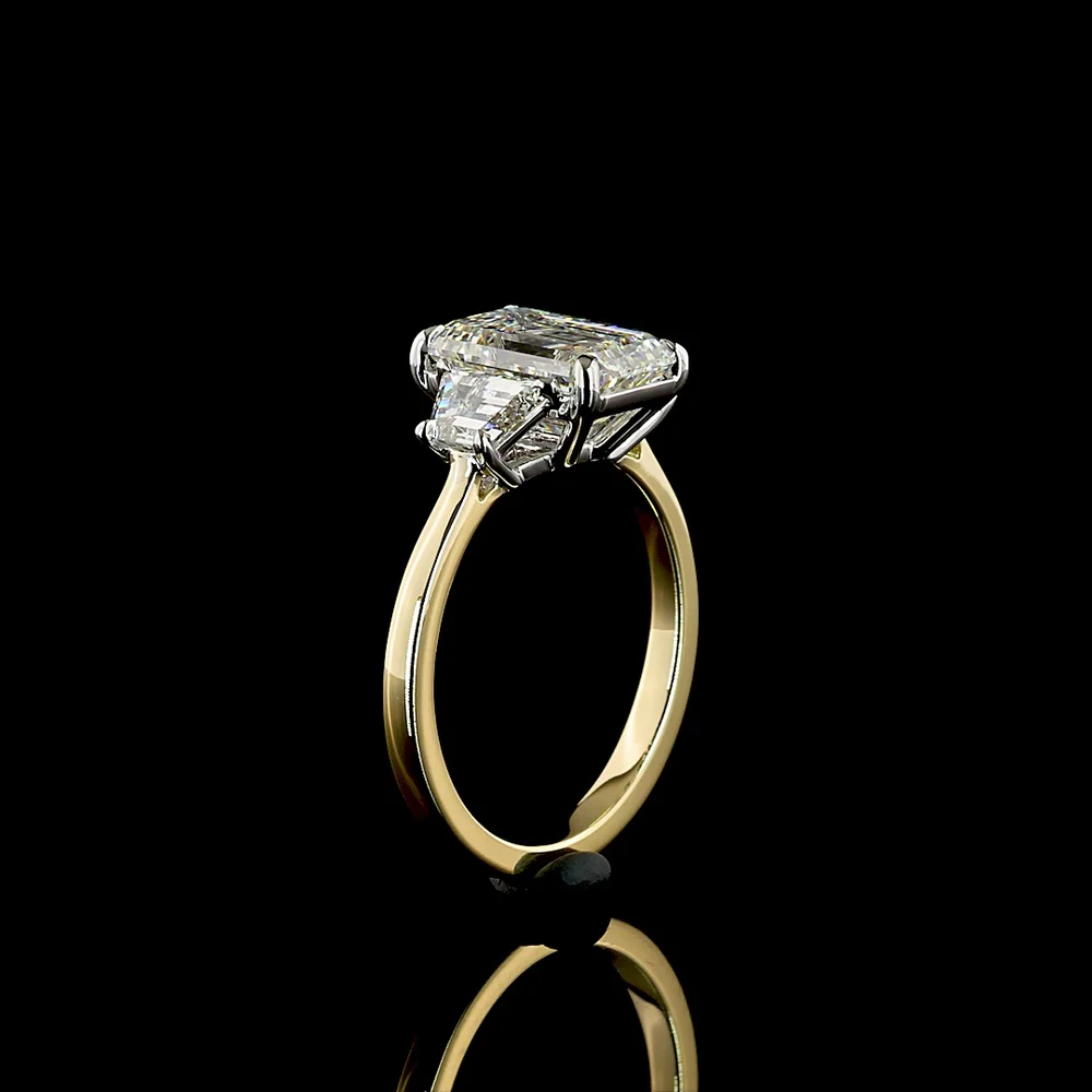 14K Two Tone Three Stone Ring with 3.05 Carat Emerald Cut Lab Diamond and 0.71 Carat Trapezoid Side Stones - 3.76 Carat Total Diamond Weight, IGI Certified E VVS2 - Covaloro Fine Jewelry - Image 4