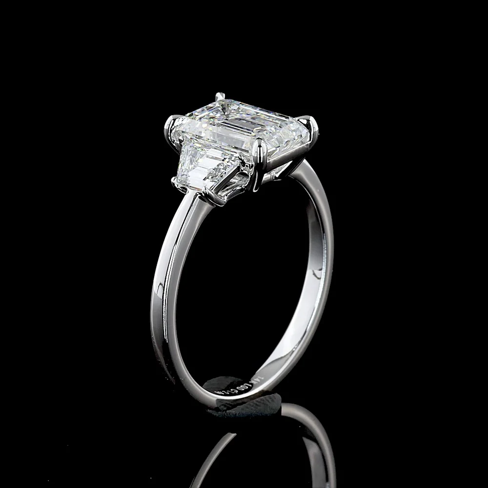14K White Gold 3-Stone Ring with 2.12 Carat Emerald Cut Lab Diamond and Trapezoid Side Stones - 2.67 Carat Total Diamond Weight - Covaloro Fine Jewelry - Image 4