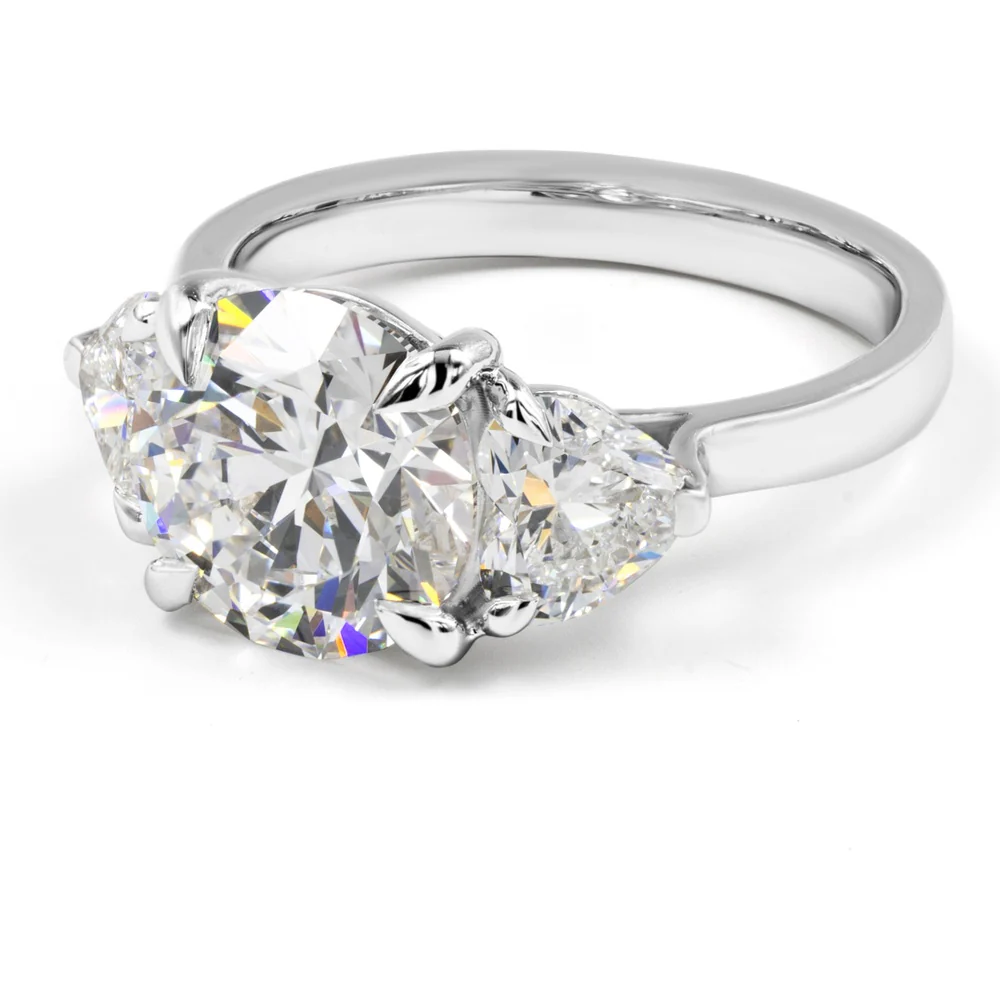 14K White Gold 3-Stone Ring with 3.00 Carats Round Brilliant Lab Diamond and 1.12 Carats Heart-Shape Lab Diamonds - 4.12 Carats Total Diamond Weight - Covaloro Fine Jewelry - Image 4