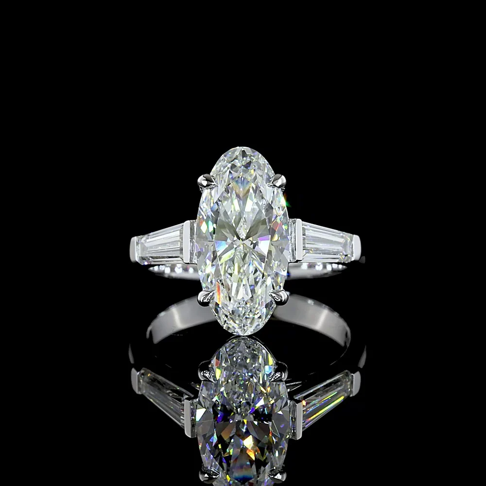 14K White Gold 3 Stone Ring with 3.06 Carat Moval Cut Lab Diamond and 0.96 Carat Tapered Baguette Lab Diamonds - 4.02 Carat Total Diamond Weight - Covaloro Fine Jewelry