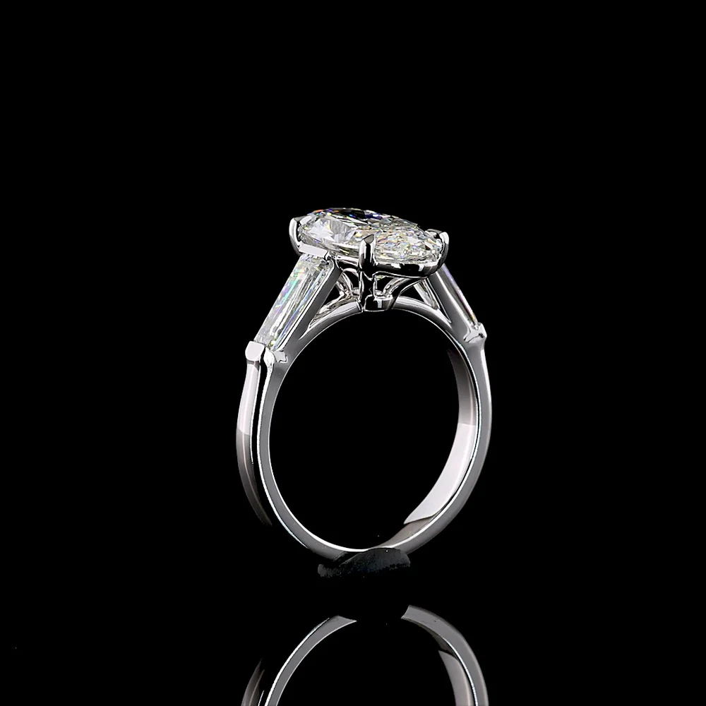 14K White Gold 3 Stone Ring with 3.06 Carat Moval Cut Lab Diamond and 0.96 Carat Tapered Baguette Lab Diamonds - 4.02 Carat Total Diamond Weight - Covaloro Fine Jewelry - Image 4
