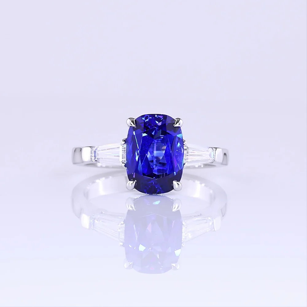14K White Gold 3-Stone Ring with Cushion Brilliant Cut Lab-Grown Blue Sapphire and Tapered Baguette Diamonds - 3.72 Carat Total Gem Weight - Covaloro Fine Jewelry