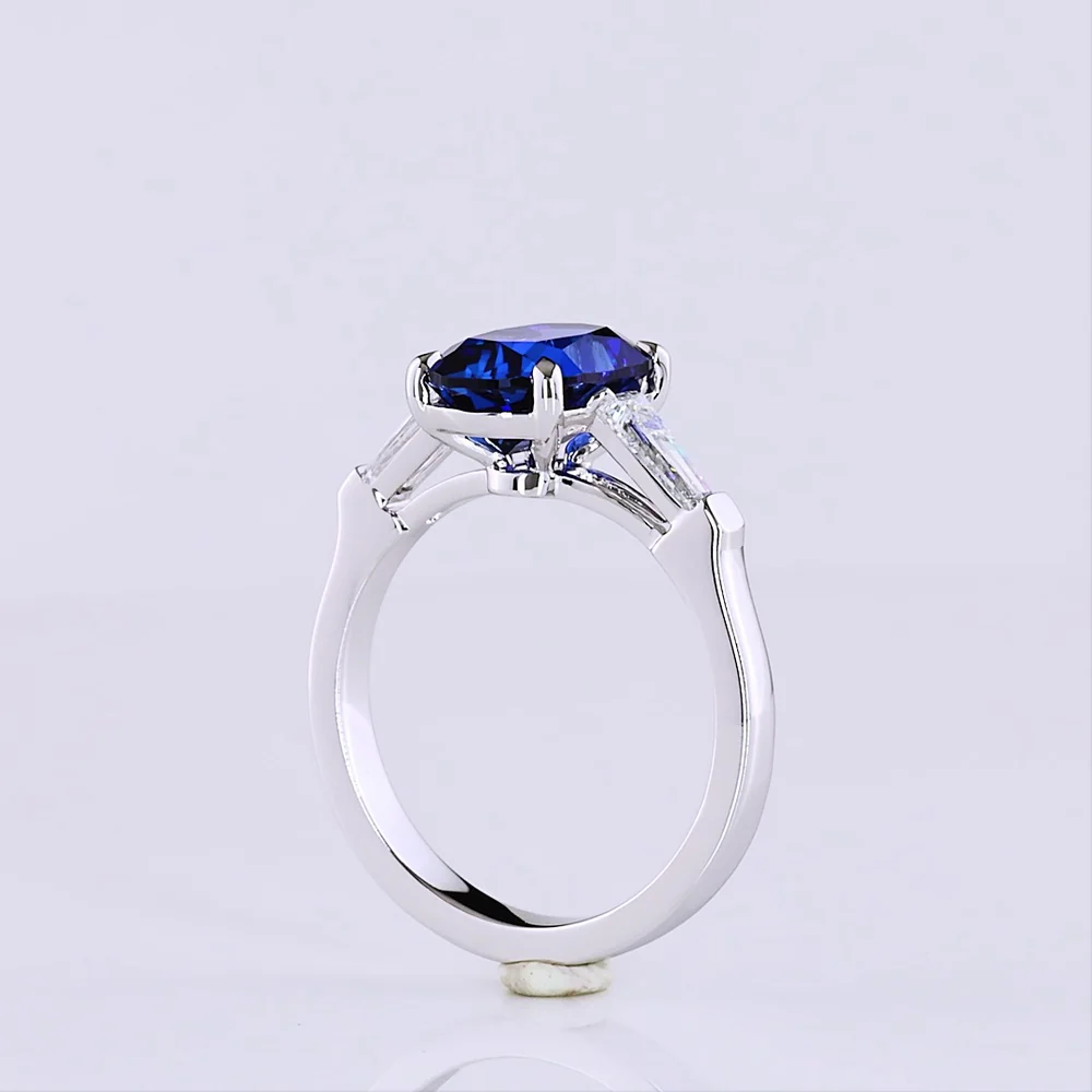 14K White Gold 3-Stone Ring with Cushion Brilliant Cut Lab-Grown Blue Sapphire and Tapered Baguette Diamonds - 3.72 Carat Total Gem Weight - Covaloro Fine Jewelry - Image 3