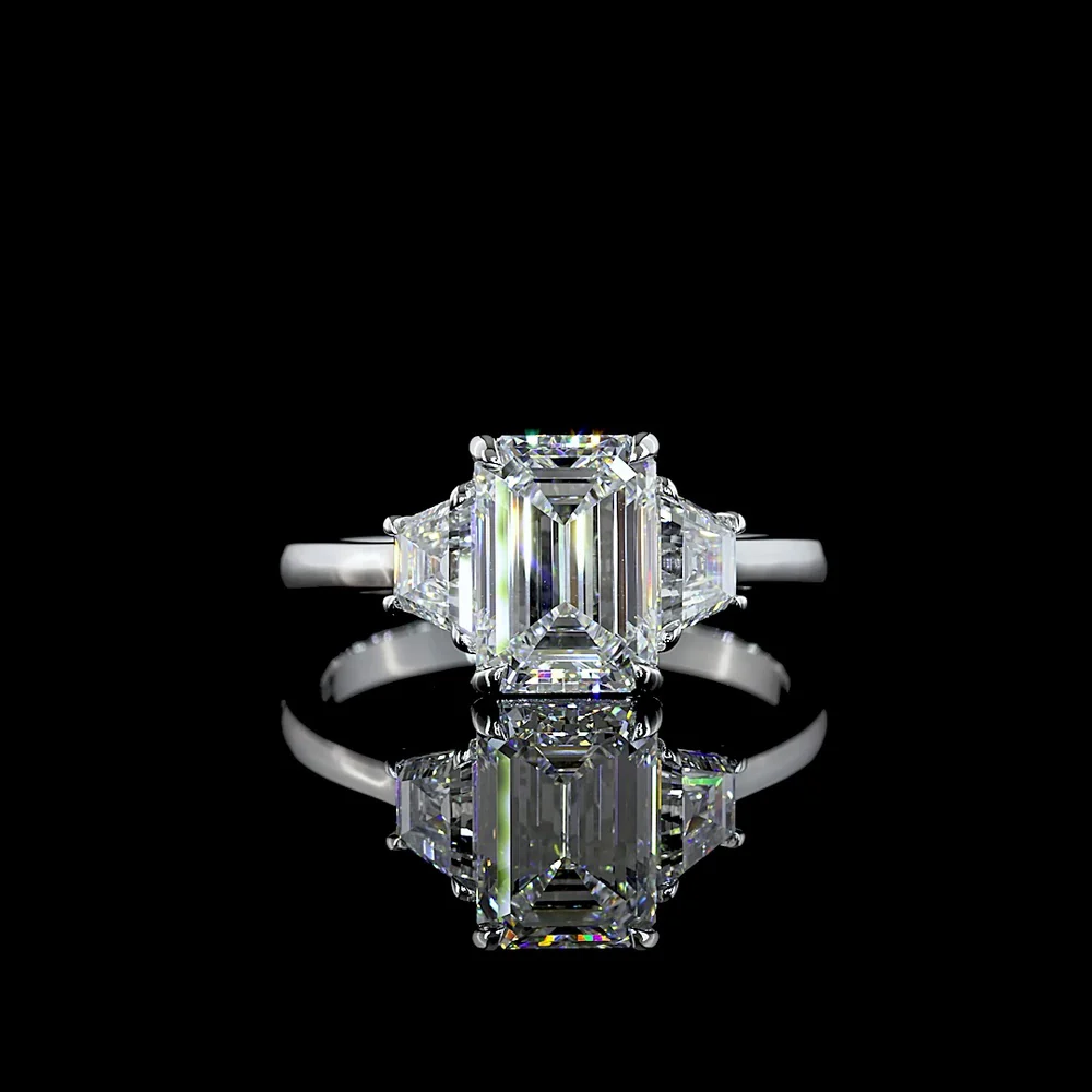 14K White Gold 3-Stone Ring with Emerald Cut Lab Diamond Center (2.07ct) and Trapezoid Side Stones (0.66ct) - 2.73 Carat Total Weight, E-F Color VS1 Clarity - Covaloro Fine Jewelry