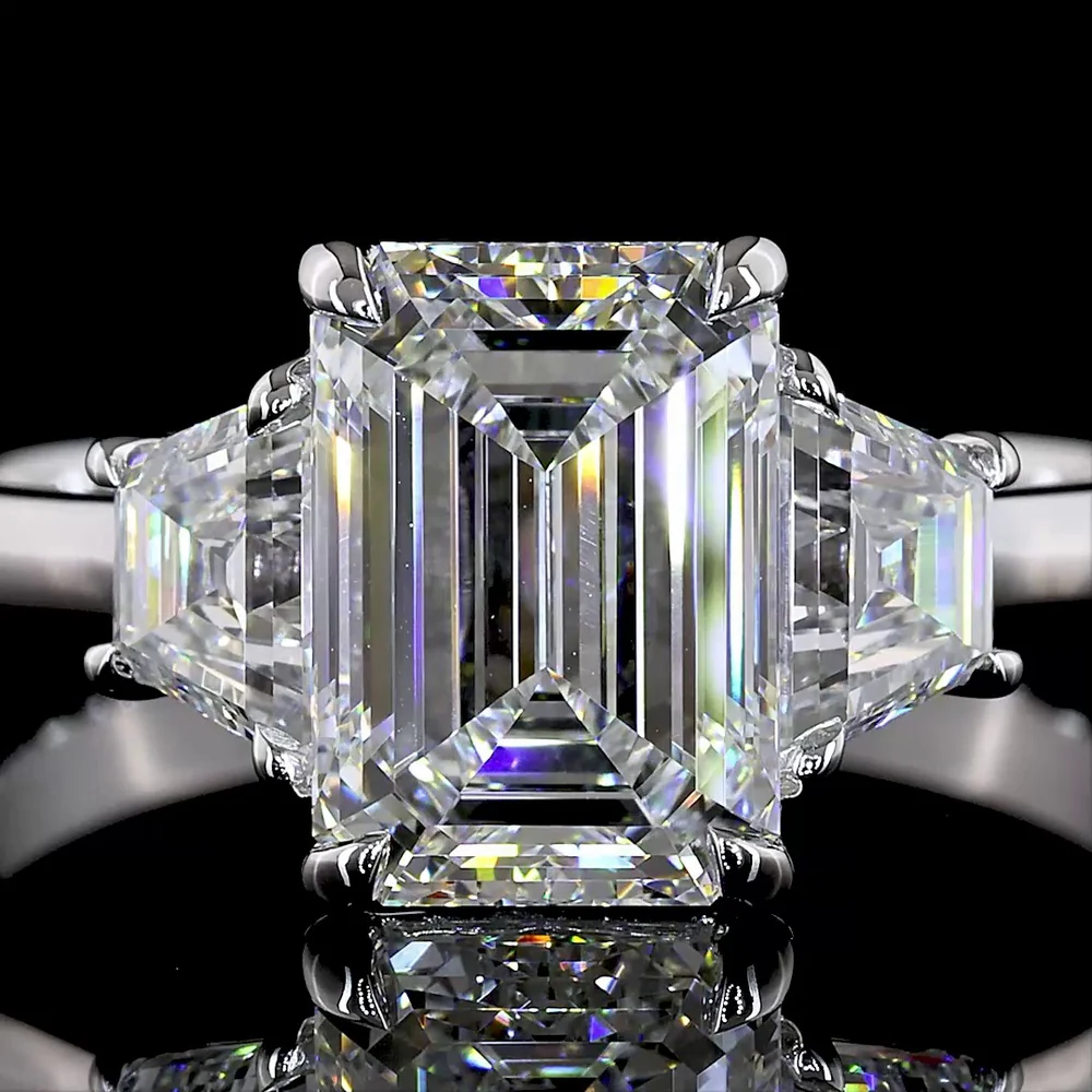 14K White Gold 3-Stone Ring with Emerald Cut Lab Diamond Center (2.07ct) and Trapezoid Side Stones (0.66ct) - 2.73 Carat Total Weight, E-F Color VS1 Clarity - Covaloro Fine Jewelry - Image 2