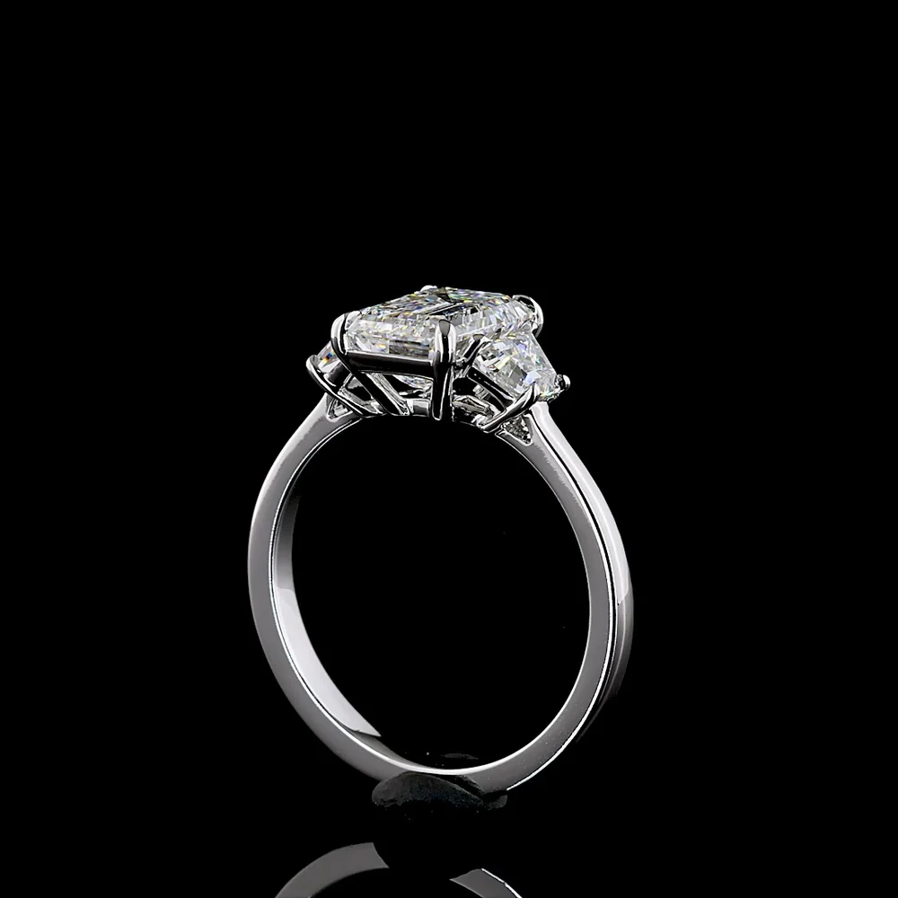 14K White Gold 3-Stone Ring with Emerald Cut Lab Diamond Center (2.07ct) and Trapezoid Side Stones (0.66ct) - 2.73 Carat Total Weight, E-F Color VS1 Clarity - Covaloro Fine Jewelry - Image 3