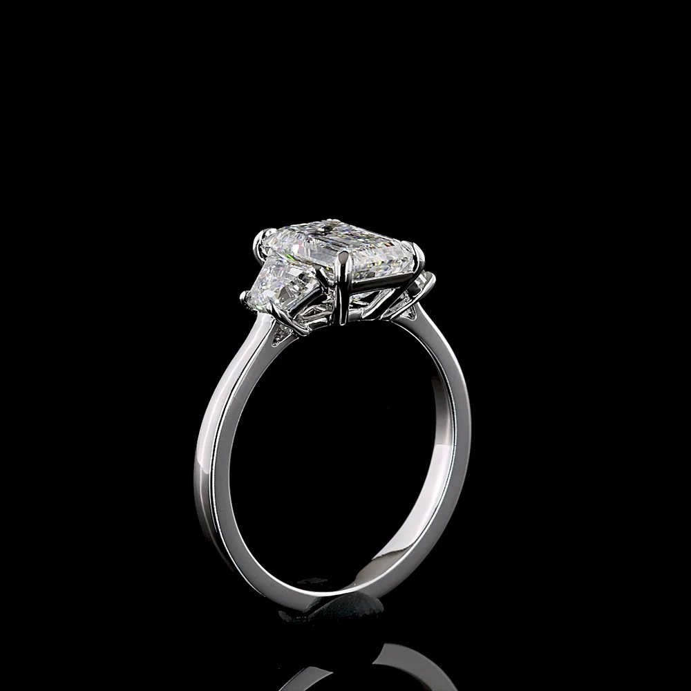 14K White Gold 3-Stone Ring with Emerald Cut Lab Diamond Center (2.07ct) and Trapezoid Side Stones (0.66ct) - 2.73 Carat Total Weight, E-F Color VS1 Clarity - Covaloro Fine Jewelry - Image 4