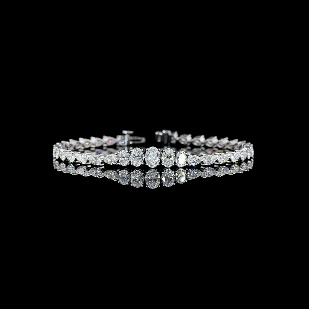 14K White Gold 6.34 Carat Graduated Oval and Pear Cut Lab Diamond Riviera Bracelet - E-F VS Clarity Prong Set - Covaloro Fine Jewelry