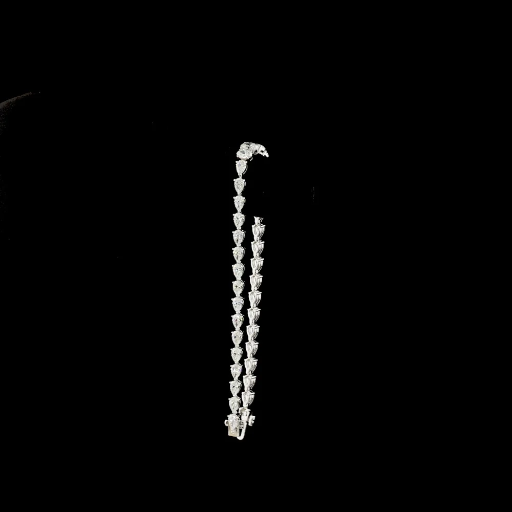 14K White Gold 6.34 Carat Graduated Oval and Pear Cut Lab Diamond Riviera Bracelet - E-F VS Clarity Prong Set - Covaloro Fine Jewelry - Image 3