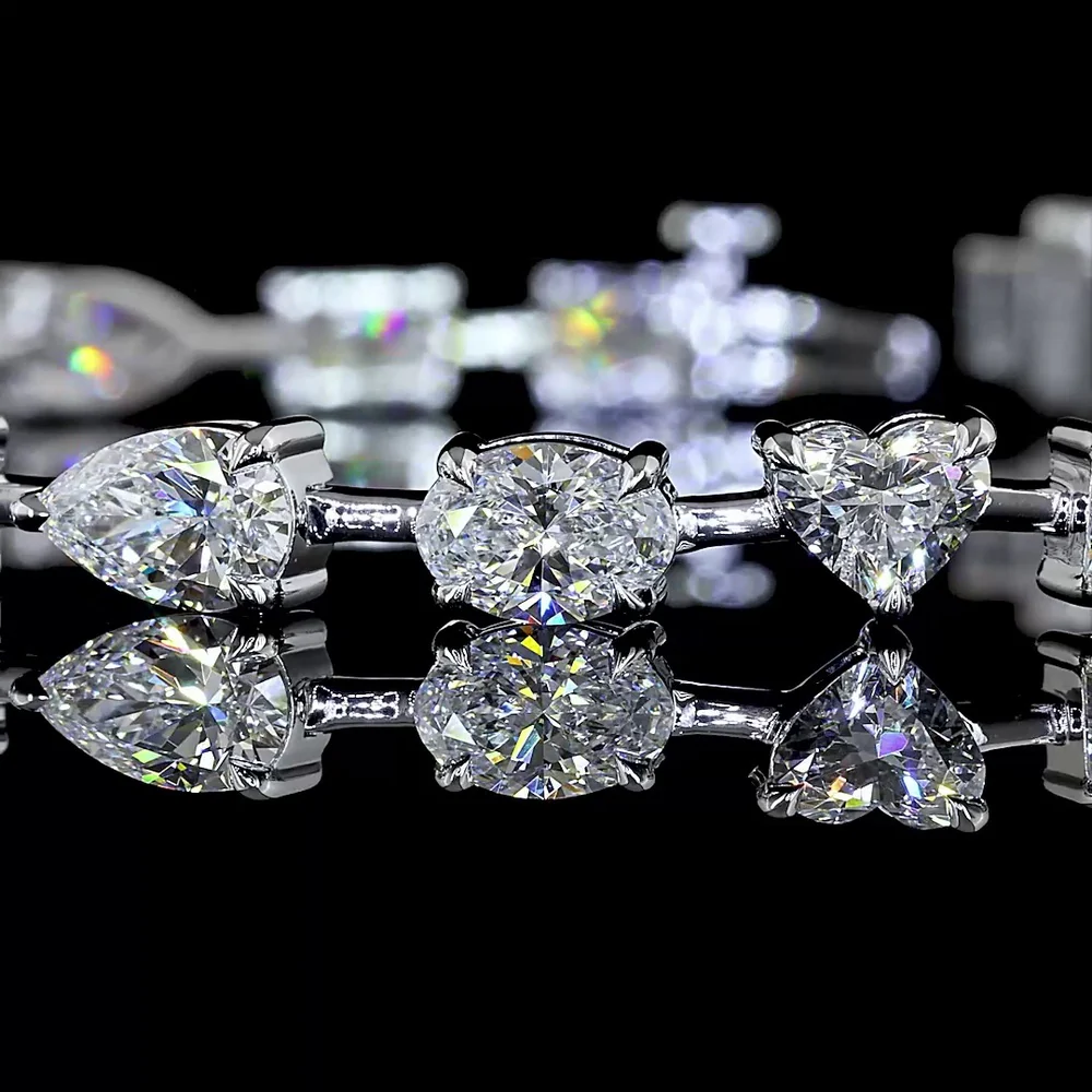 14K White Gold 7.25-Inch Mixed Shape Station Bracelet with Pear, Oval, and Radiant Lab-Grown Diamonds - 9.92 Carat Total Weight - Covaloro Fine Jewelry - Image 2