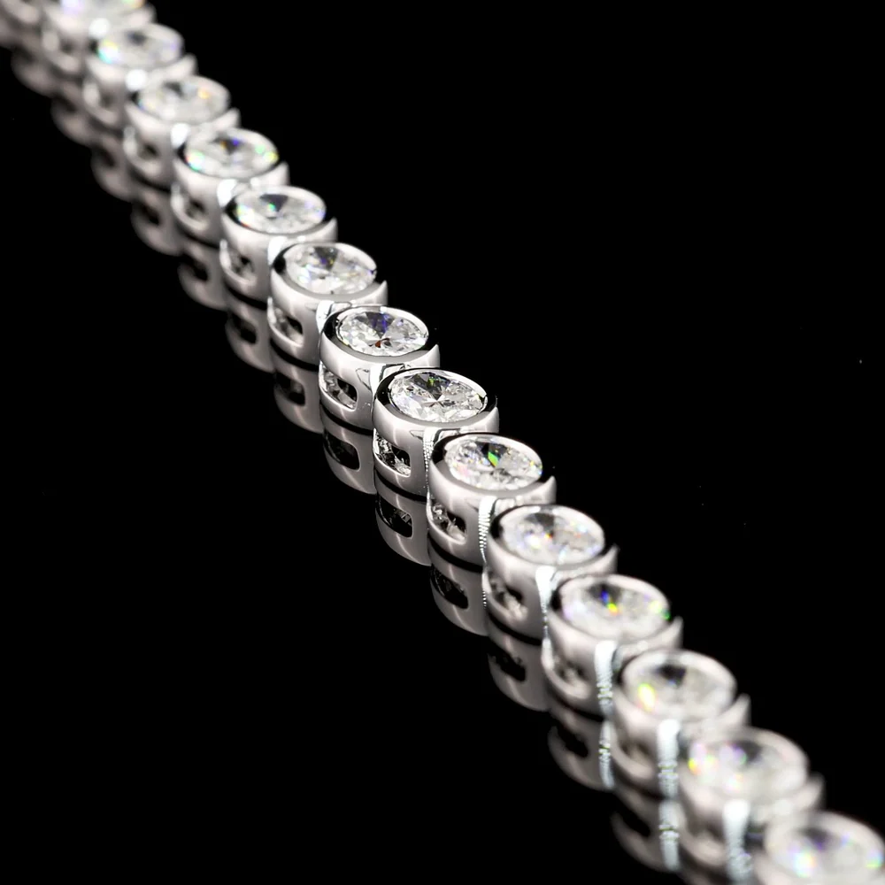 14K White Gold 7.25" Tennis Bracelet with East-West Bezel Set Oval Cut Lab Diamonds - 5.27 Carat Total Weight, F VS1 - Covaloro Fine Jewelry - Image 2
