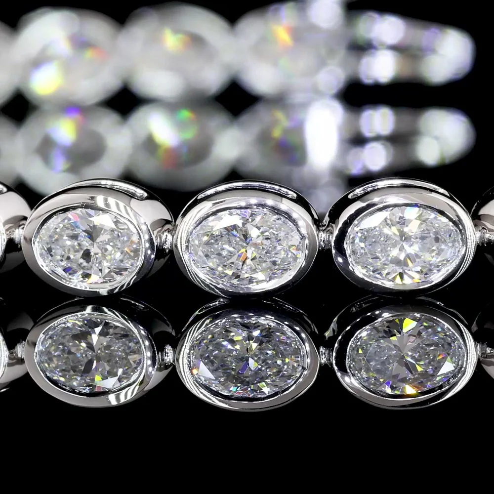 14K White Gold 7.25" Tennis Bracelet with East-West Bezel Set Oval Cut Lab Diamonds - 5.27 Carat Total Weight, F VS1 - Covaloro Fine Jewelry - Image 3