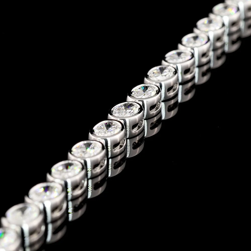 14K White Gold 7.25" Tennis Bracelet with East-West Bezel Set Oval Cut Lab Diamonds - 5.27 Carat Total Weight, F VS1 - Covaloro Fine Jewelry - Image 4