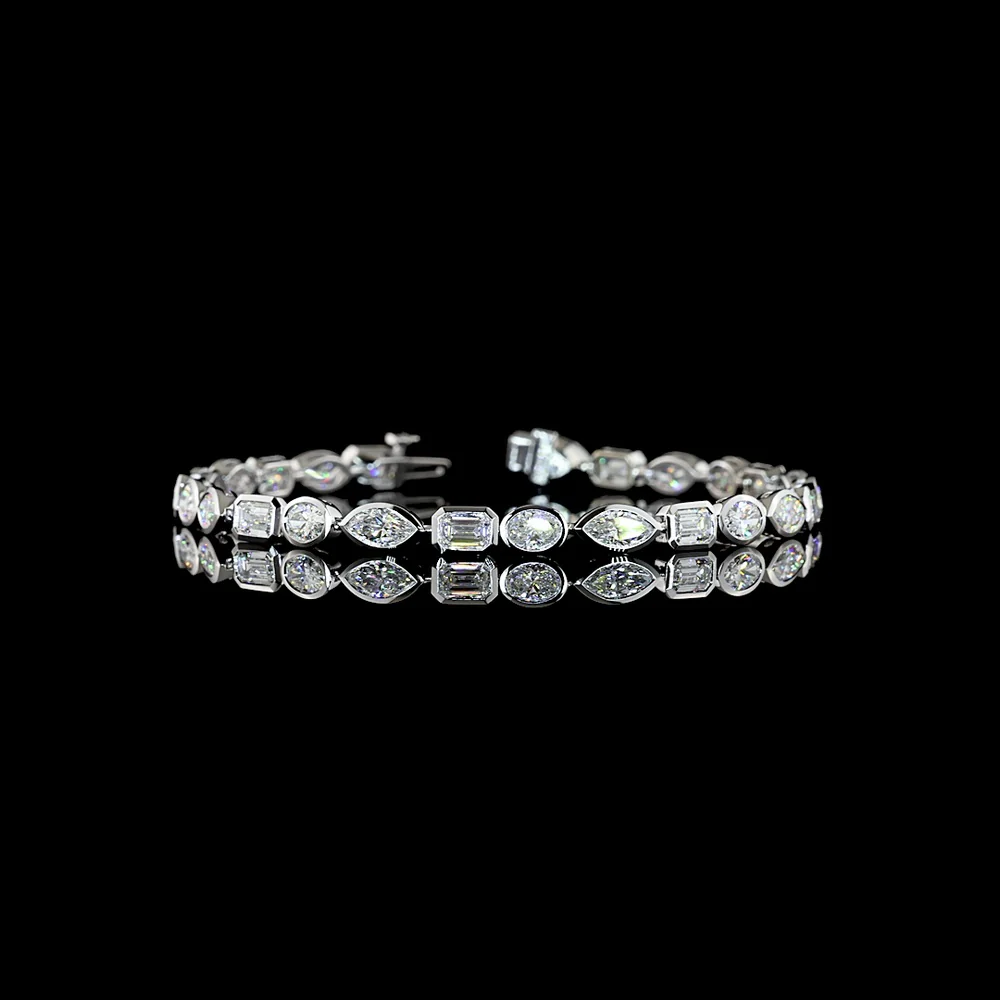 14K White Gold 7.36 Carats East-West Mixed Shape Tennis Bracelet with Bezel Set Lab Diamonds - Emerald, Marquise & Oval Cuts, E-F VS Clarity - Covaloro Fine Jewelry
