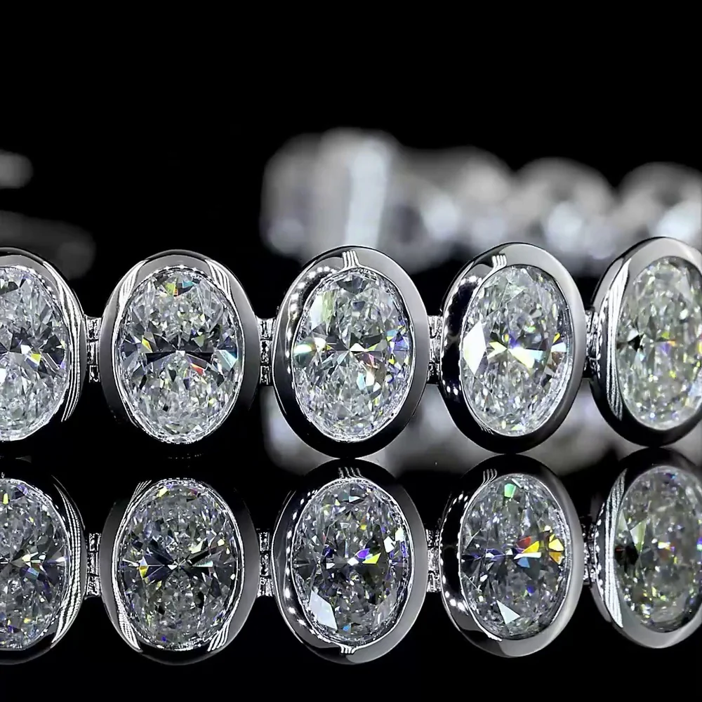 14K White Gold 7.5" Tennis Bracelet with 34 Bezel Set Oval Cut Lab Diamonds - 10.74 Carat Total Weight with E-F Color and VS1 Clarity - Covaloro Fine Jewelry - Image 2