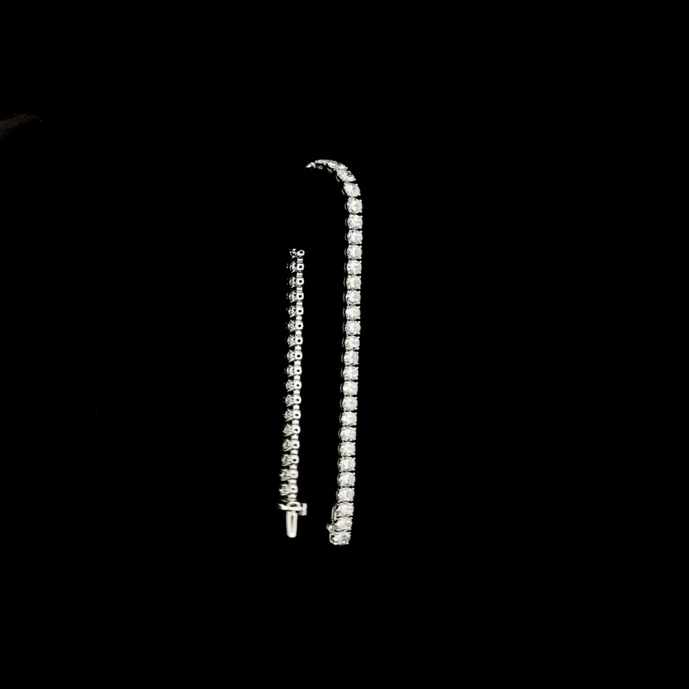 14K White Gold 7.5" Tennis Bracelet with 49 Prong-Set Oval Lab Grown Diamonds - 10.47 Carat Total Diamond Weight, D VS1 Clarity - Covaloro Fine Jewelry - Image 3