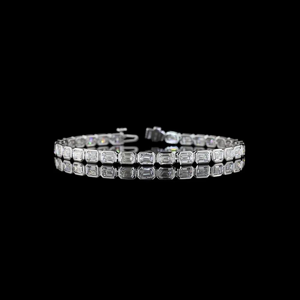 14K White Gold 7.90 Carat East-West Emerald Cut Lab Diamond Tennis Bracelet with Bezel Setting - 31 Stones E-F VS Quality - Covaloro Fine Jewelry