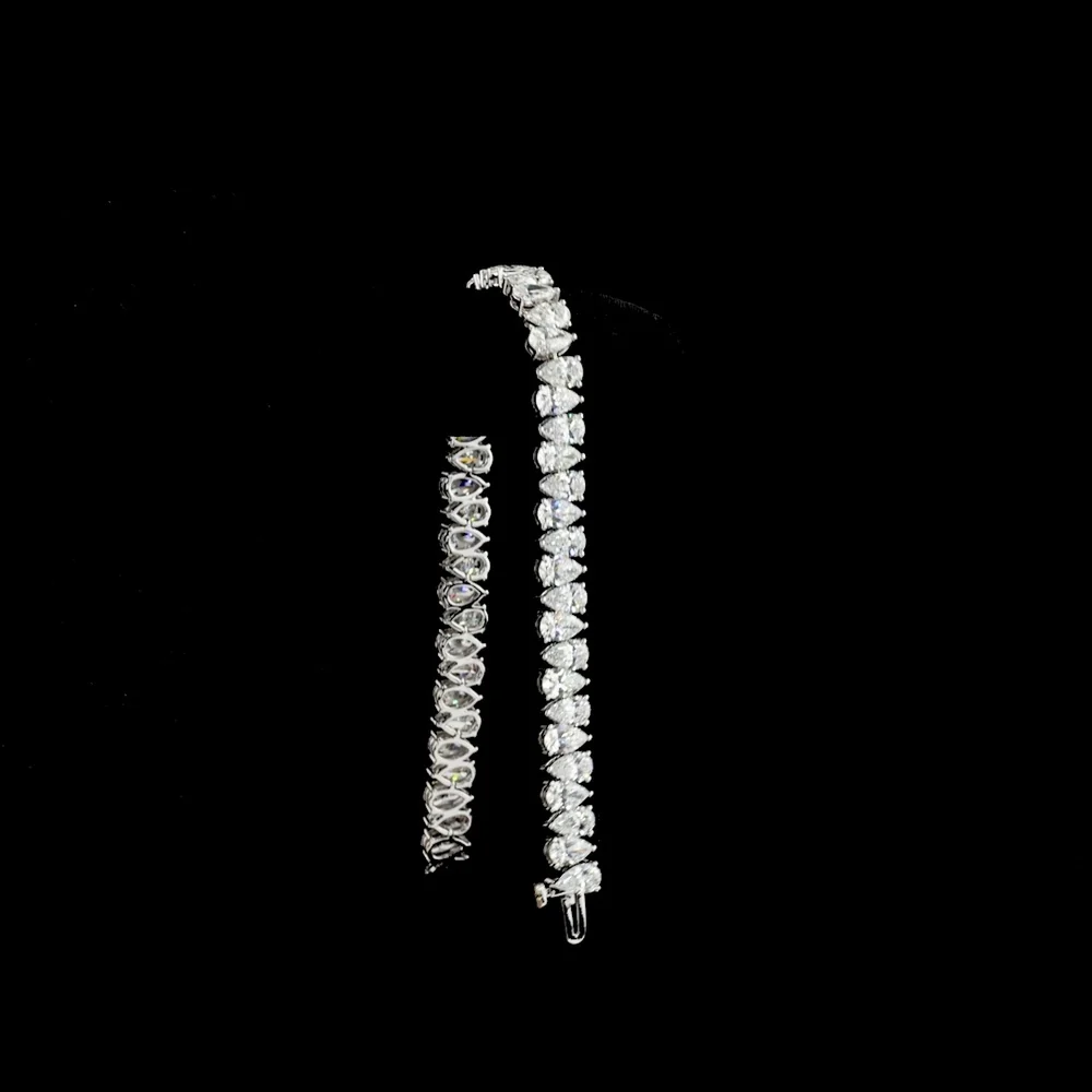14K White Gold 7-Inch Pear Shape Lab Diamond Tennis Bracelet - 14.87 Carat Total Weight, E-F Color VS Clarity, 52 Prong-Set Stones - Covaloro Fine Jewelry - Image 3
