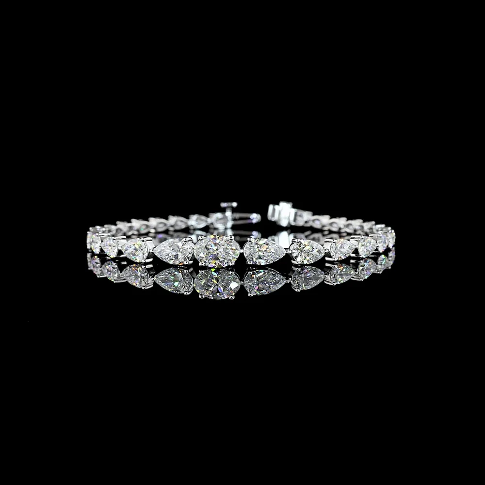 14K White Gold 8.61 Carats East-West Oval and Pear Lab Diamond Riviera Bracelet in Prong Setting - E-F VS1 Quality - Covaloro Fine Jewelry