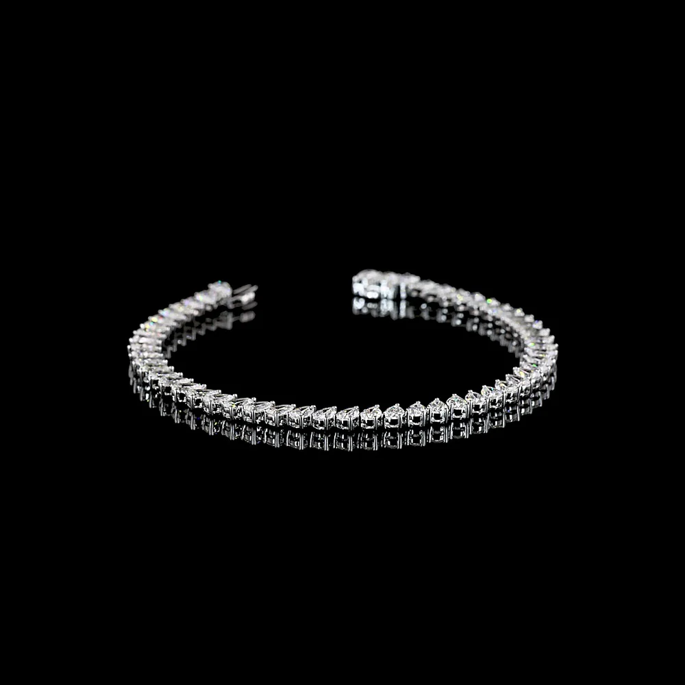 14K White Gold 8.86 Carat Pear-Shape Tennis Bracelet with Inclined Prong-Set E-F VS1 Lab Diamonds - 52 Stones - Covaloro Fine Jewelry