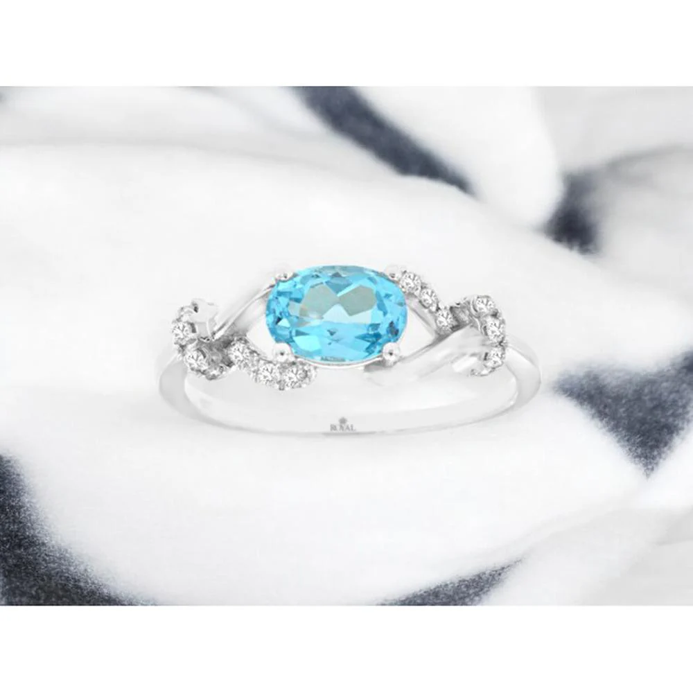 14K White Gold Blue Topaz & Diamond Ring with Oval Blue Topaz and Diamond Accents - 1.05 Carats Total Gem Weight - Royal Jewelry - Image 2