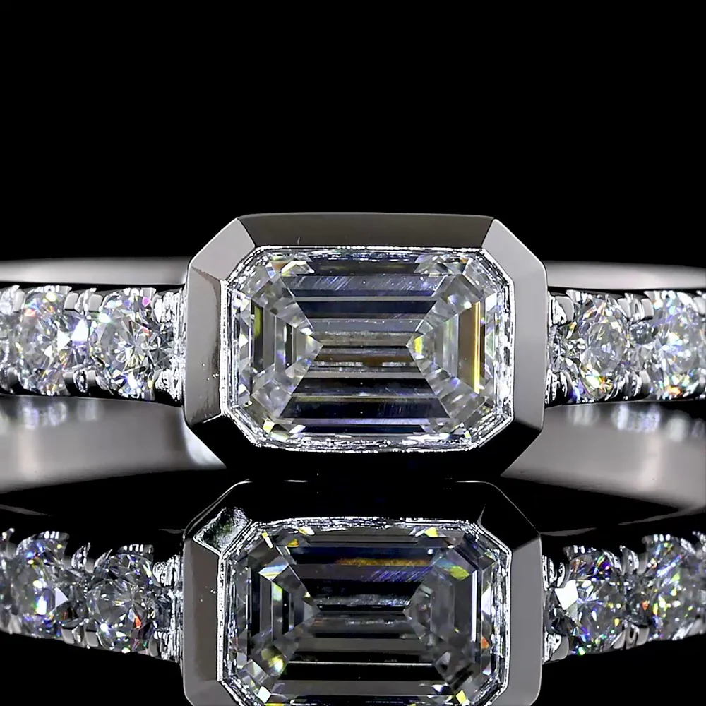 14K White Gold East-West Emerald Cut Lab Diamond Solitaire Ring with Brilliant Cut Diamond Shank - 0.74 Carats Total Diamond Weight - Covaloro Fine Jewelry - Image 2
