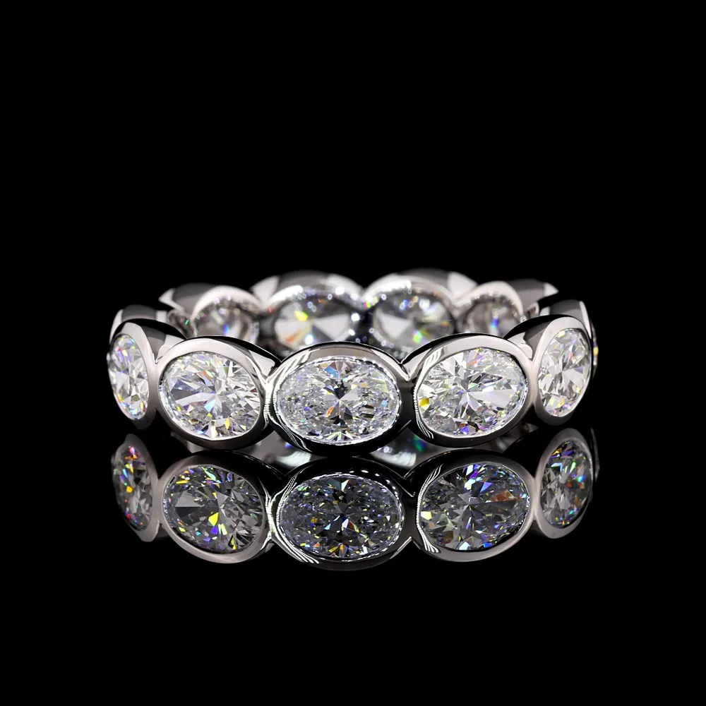 14K White Gold East-West Oval Cut Lab Diamond Eternity Band - 11 Bezel Set Stones, 4.02 Carat Total Weight, E-F VS1 Clarity - Covaloro Fine Jewelry
