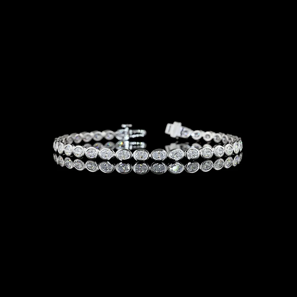 14K White Gold East-West Oval Cut Lab Diamond Tennis Bracelet with Bezel Setting - 4.08 Carat Total Diamond Weight (E-F Color, VS Clarity) - Covaloro Fine Jewelry