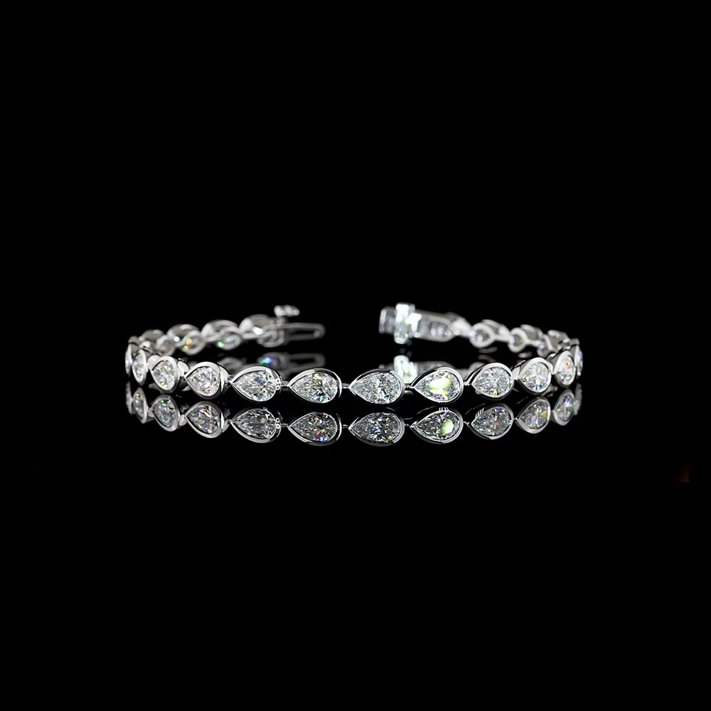 14K White Gold East-West Pear Shape Tennis Bracelet with Bezel Set Lab Diamonds - 7.65 Carat Total Weight (E-F Color, VS Clarity) - Covaloro Fine Jewelry