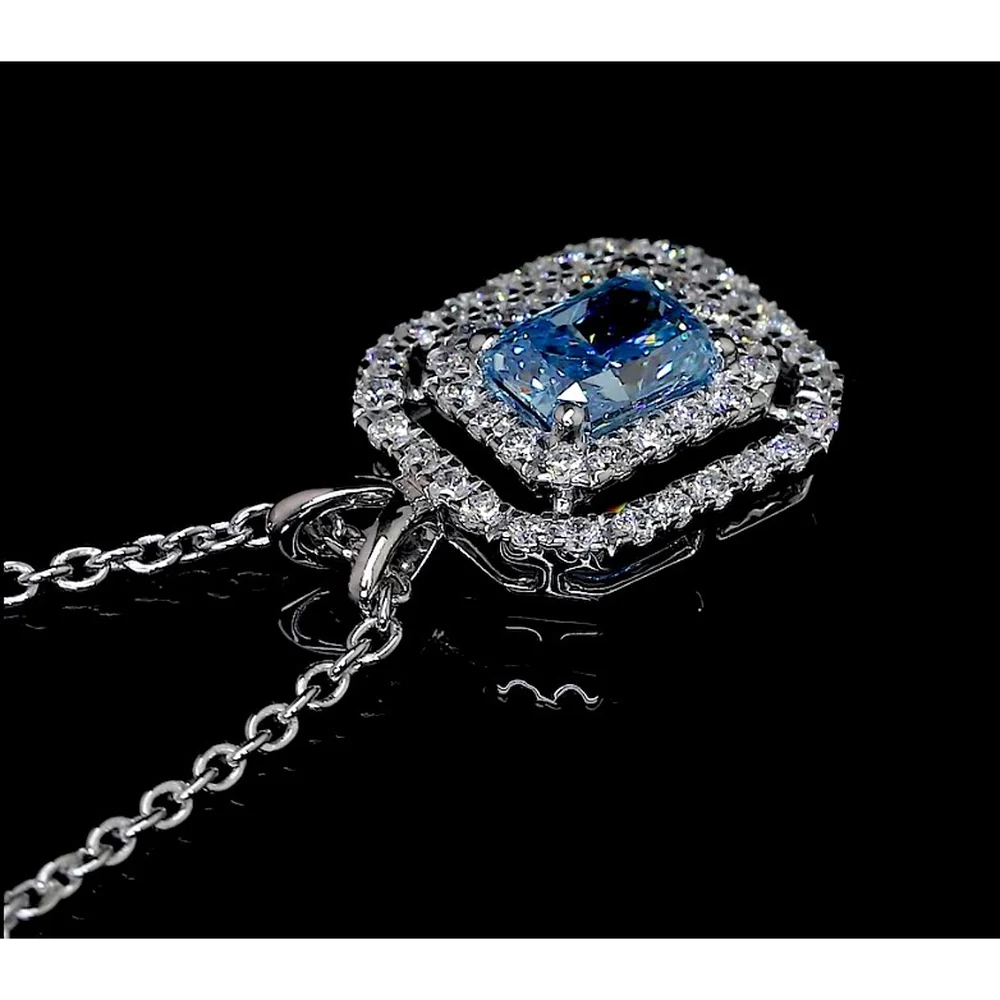 14K White Gold East-West Radiant Cut Double Halo Pendant with Fancy Vivid Blue Lab Diamond - 0.72 Total Carat Weight - Covaloro Fine Jewelry - Image 4