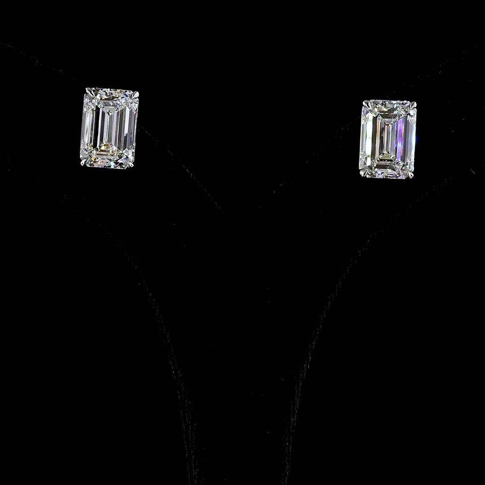 14K White Gold Emerald Cut Lab Diamond Stud Earrings - 10.29 Total Carat Weight, E-F Color, VVS2 Clarity, Prong Set in North-South Orientation - Covaloro Fine Jewelry