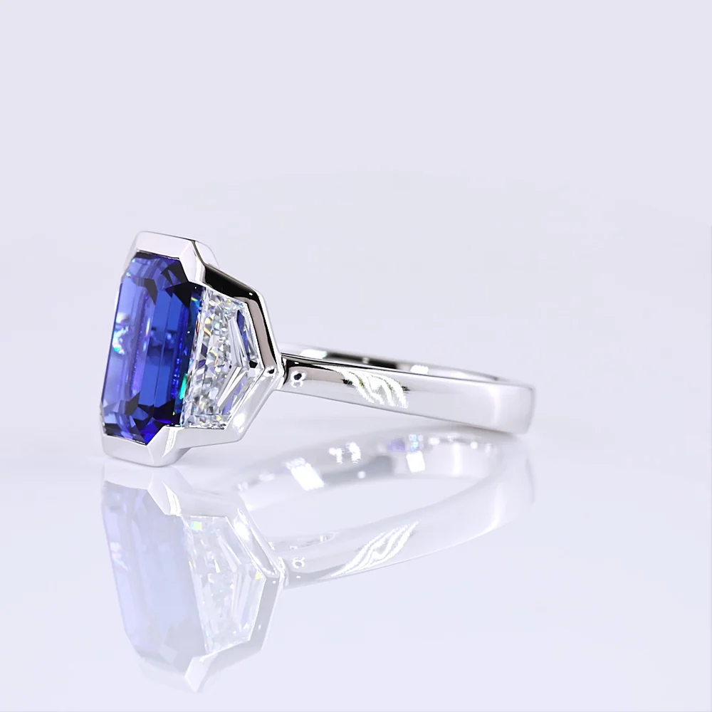14K White Gold Emerald Cut Three-Stone Ring with 4.73 Carats Blue Lab Gemstone and 1.54 Carats Cadillac-Cut Lab Diamonds - 6.27 Carats Total Carat Weight - Covaloro Fine Jewelry - Image 3
