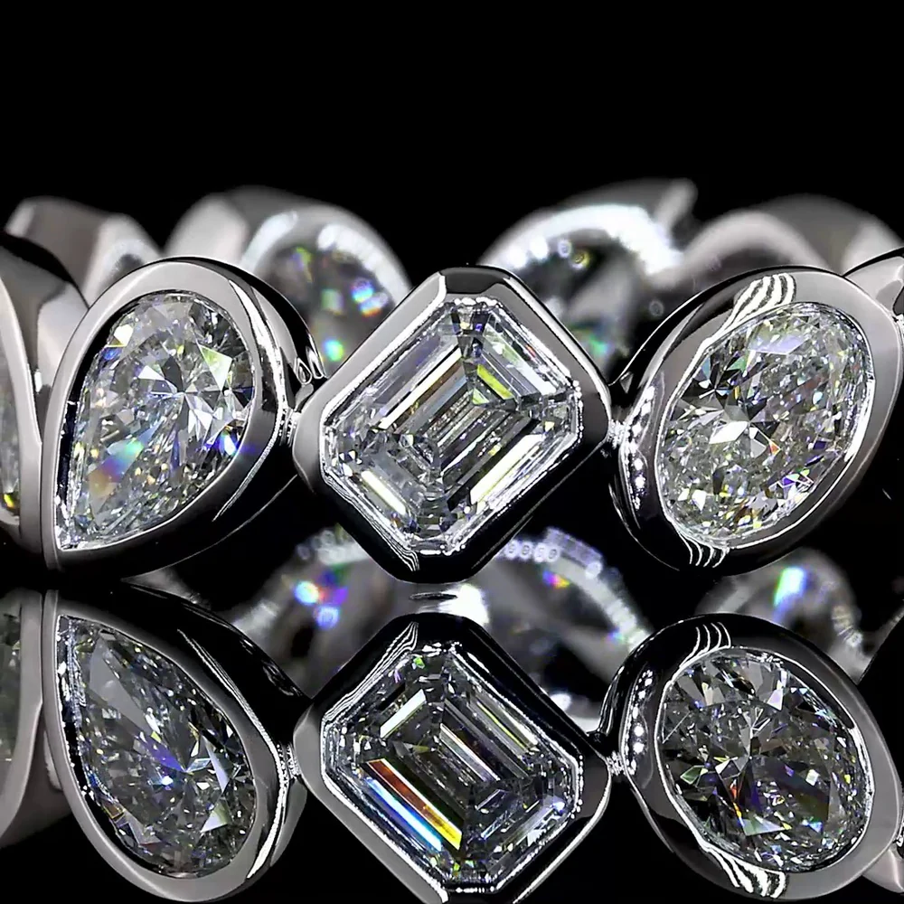 14K White Gold Eternity Band with Alternating Emerald Cut, Pear Shape, and Oval Cut Lab Diamonds in Bezel Settings - 2.62 Carat Total Diamond Weight - Covaloro Fine Jewelry - Image 2