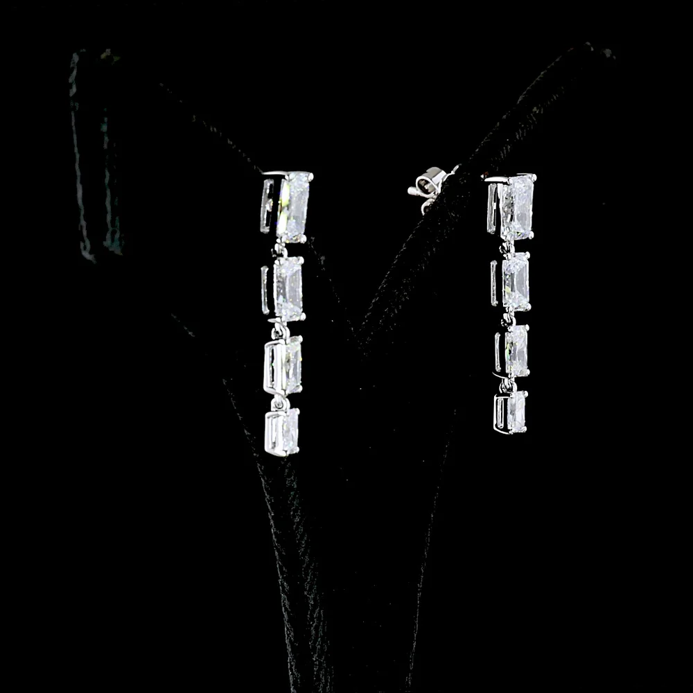 14K White Gold Graduated Radiant Cut Lab Diamond Hanging Earrings - 3.99 Carats Total Diamond Weight, E-F Color, VS1 Clarity - Covaloro Fine Jewelry - Image 3