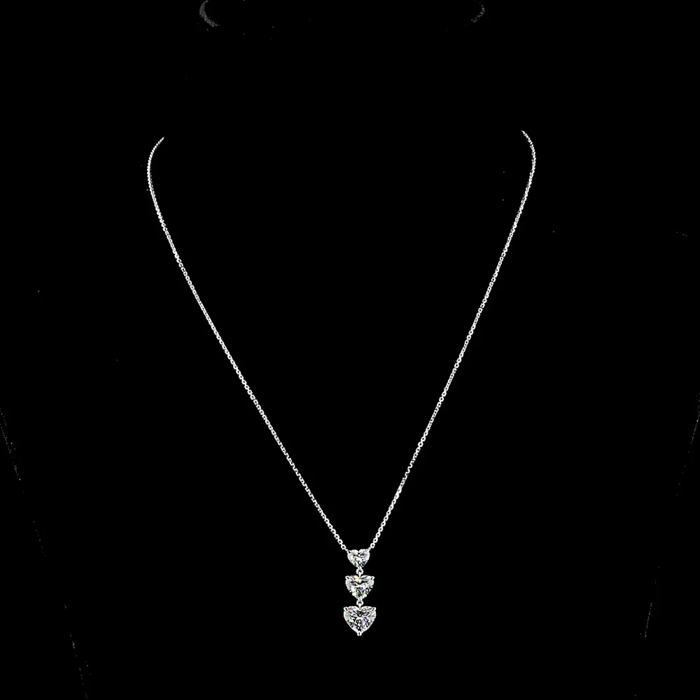 14K White Gold Graduated Three-Stone Heart Shaped Lab Diamond Pendant - 2.99 Carat Total Weight, E-VS1 Clarity - Covaloro Fine Jewelry - Image 4