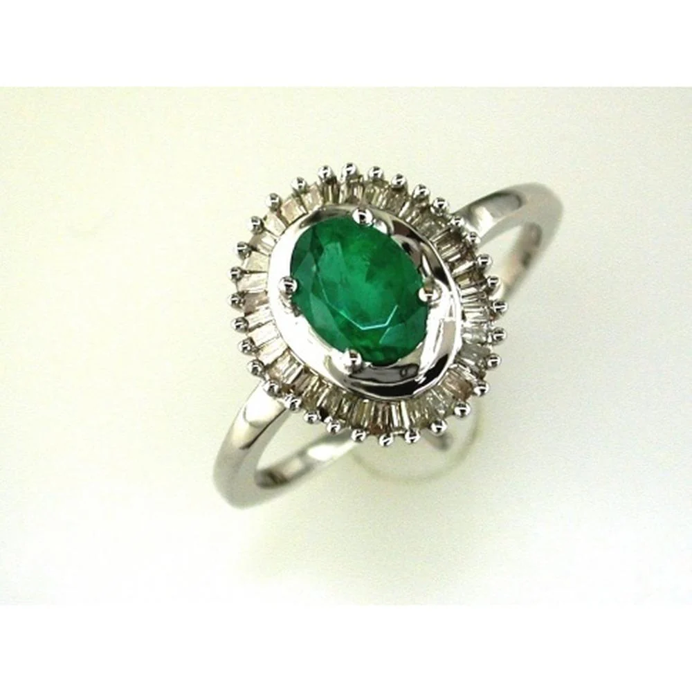 14K White Gold Halo Ring with Oval Emerald and Baguette Diamonds - 0.80 Carat Emerald & 0.25 Carat Total Diamond Weight - Royal Jewelry