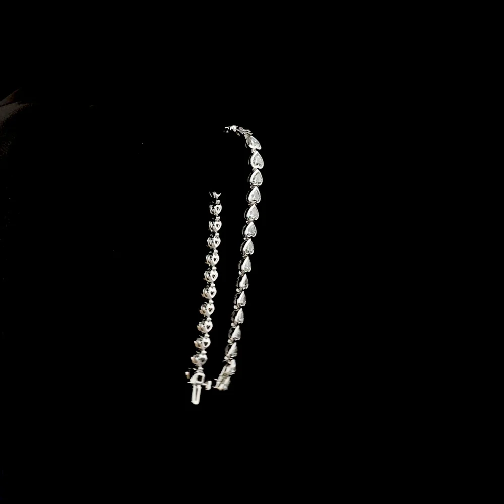 14K White Gold Heart Shape Tennis Bracelet with Bezel Set Lab Diamonds - 11.18 Carats Total Diamond Weight - Covaloro Fine Jewelry - Image 3