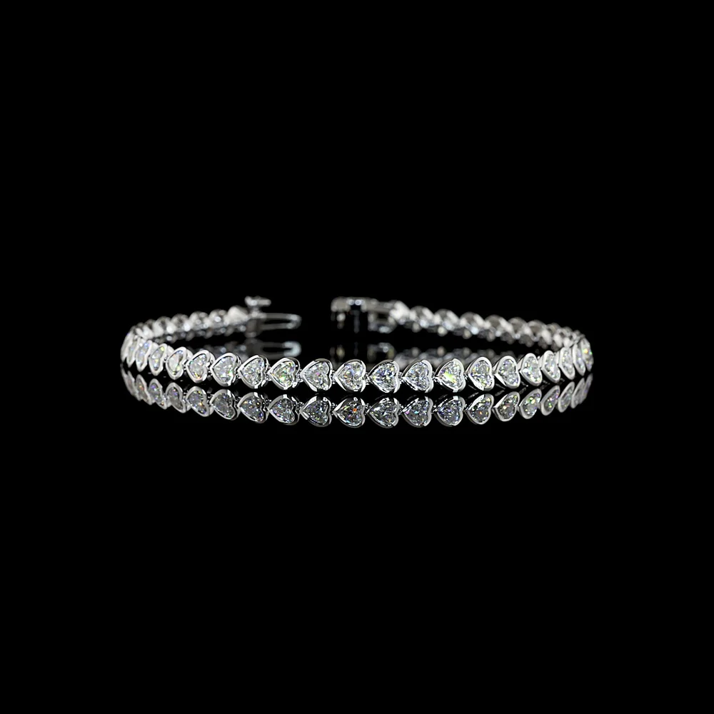 14K White Gold Heart Shape Tennis Bracelet with East-West Bezel Set Lab Diamonds - 5.43 Carat Total Weight - Covaloro Fine Jewelry