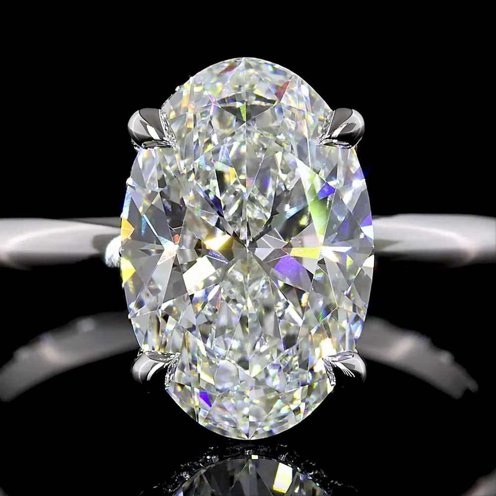 14K White Gold Hidden Halo Ring with 3.12 Carat Oval Cut Lab Diamond and 0.12 Carat Brilliant Cut Diamond Accents - 3.24 Total Carat Weight - Covaloro Fine Jewelry - Image 2