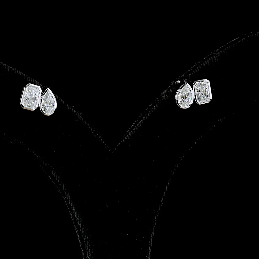 14K White Gold Mixed Shape Bezel Set Stud Earrings featuring Pear and Radiant Cut Lab Diamonds - 1.70 Carat Total Weight - Covaloro Fine Jewelry