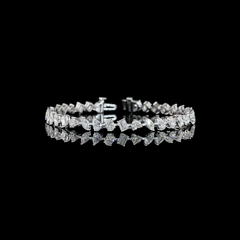14K White Gold Mixed Shape Station Bracelet with 36 Lab Diamonds in Emerald, Oval, Pear, and Heart Cuts - 7.38 Carats Total Diamond Weight - Covaloro Fine Jewelry