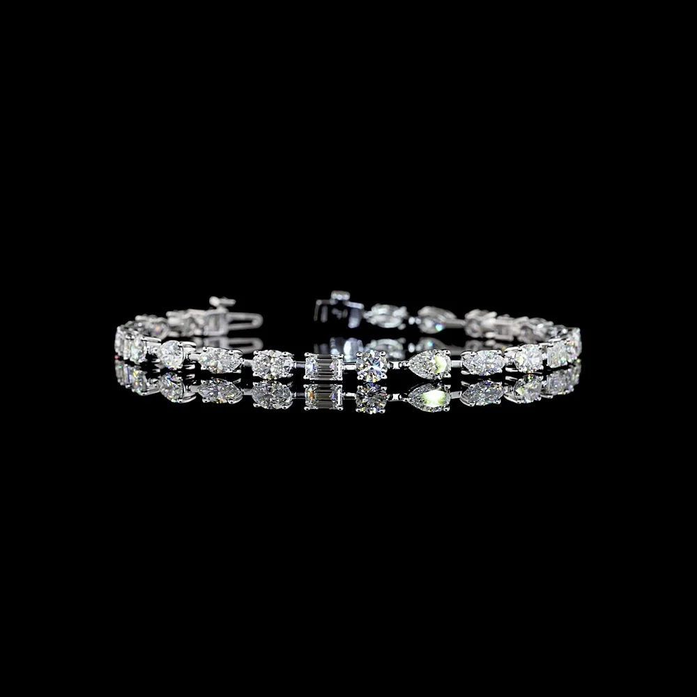 14K White Gold Mixed Shape Station Bracelet with Emerald, Pear, Oval, and Round Cut Natural Diamonds - 7.20 Carats Total Diamond Weight - Covaloro Fine Jewelry