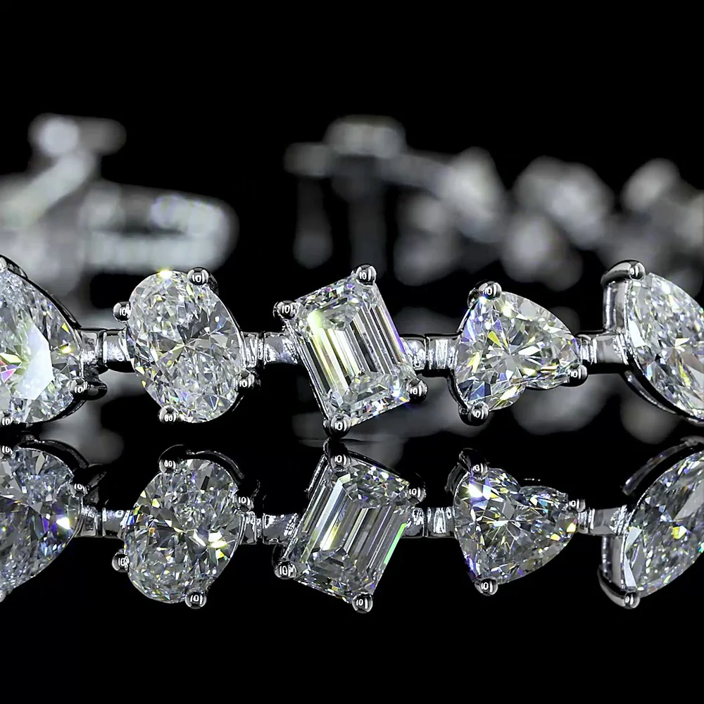 14K White Gold Mixed Shape Station Bracelet with Inclined Prong-Set Emerald, Oval, Pear, and Heart Lab Diamonds - 7.51 Carats Total Diamond Weight - Covaloro Fine Jewelry - Image 2