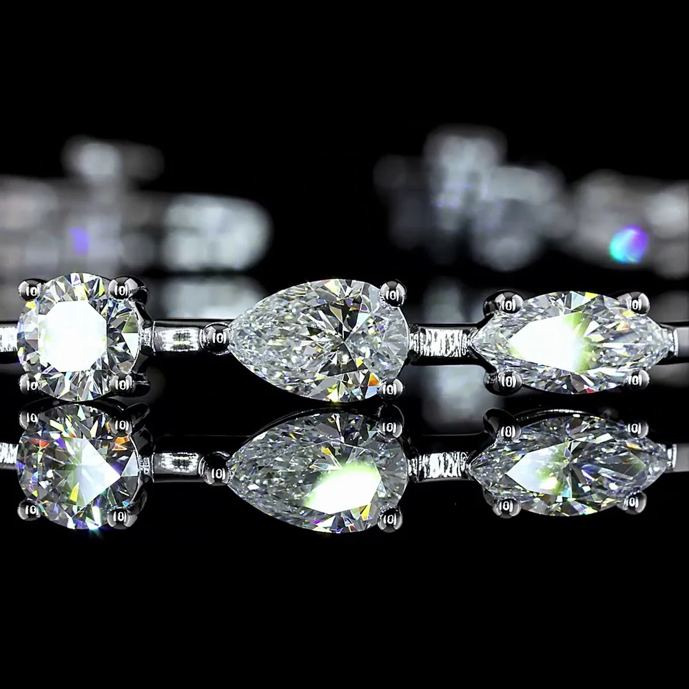 14K White Gold Mixed Shape Station Bracelet with Oval, Pear, Emerald, and Marquise Cut Natural Diamonds - 7.27 Carat Total Weight - Covaloro Fine Jewelry - Image 2